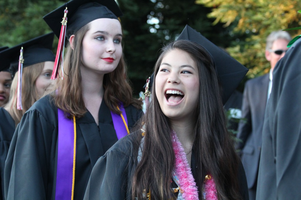2013 graduates Rachel Chow (front) and Corrie Clapsaddle (back).